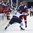 POPRAD, SLOVAKIA - APRIL 22: Finland's Aleksi Anttalainen #4 checks Russia's Kirill Maximov #16 during semifinal round action at the 2017 IIHF Ice Hockey U18 World Championship. (Photo by Andrea Cardin/HHOF-IIHF Images)